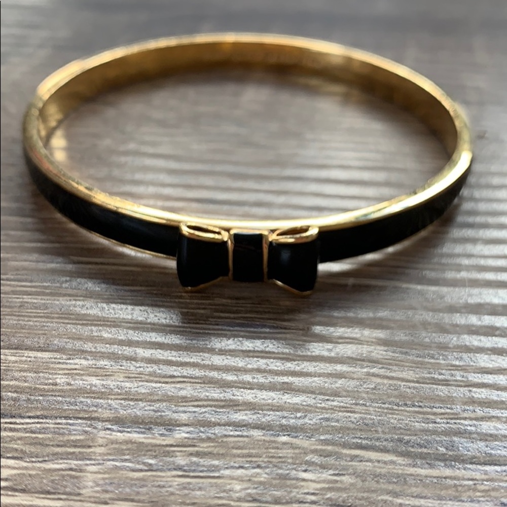 Kate Spade Bow bangle in black and gold